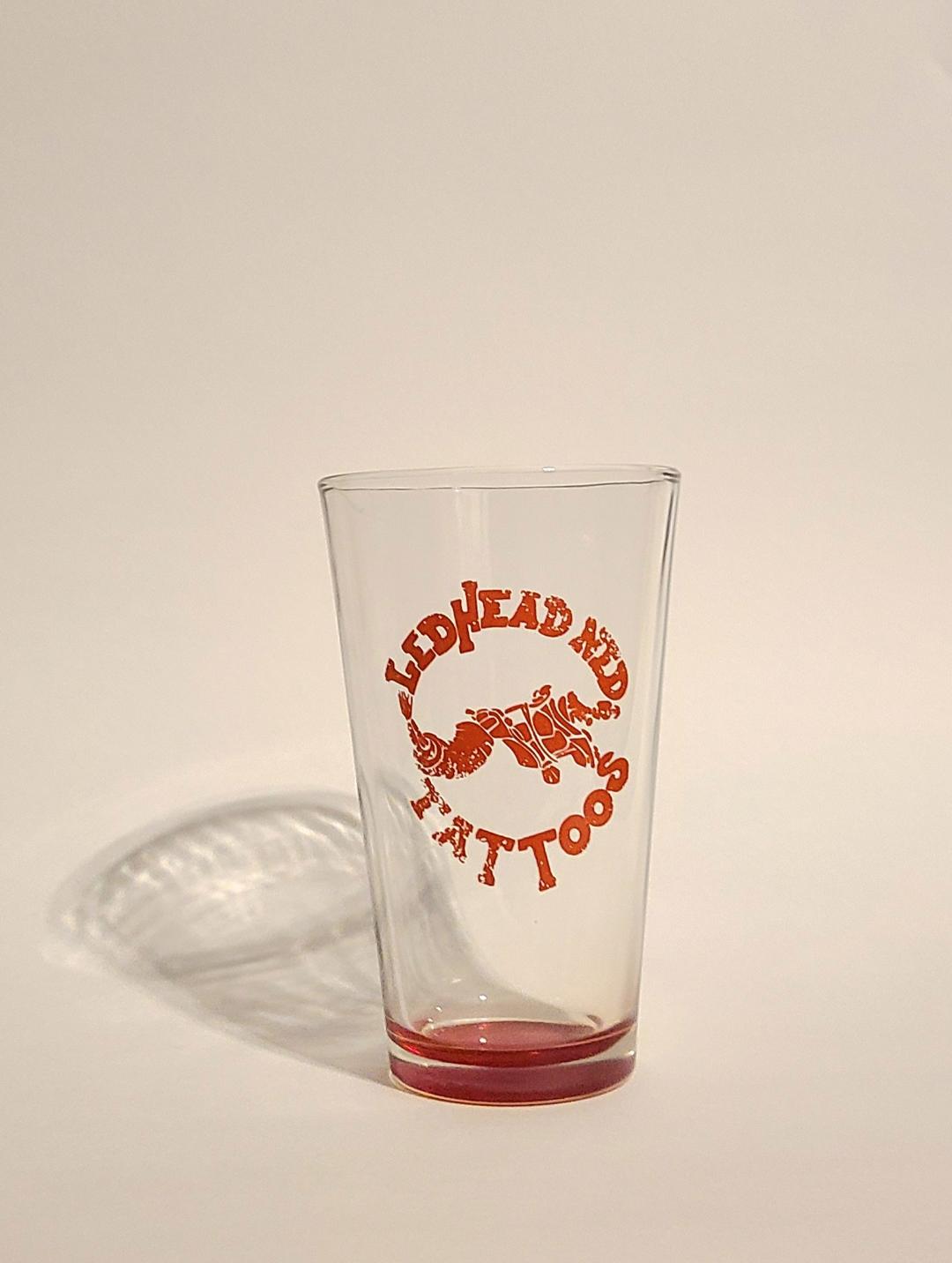 D. Pint Glass with Logo